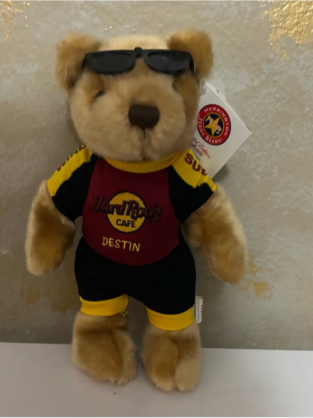 Hard Rock Cafe Authentic Destin plush bear with maroon, black & yellow outfit